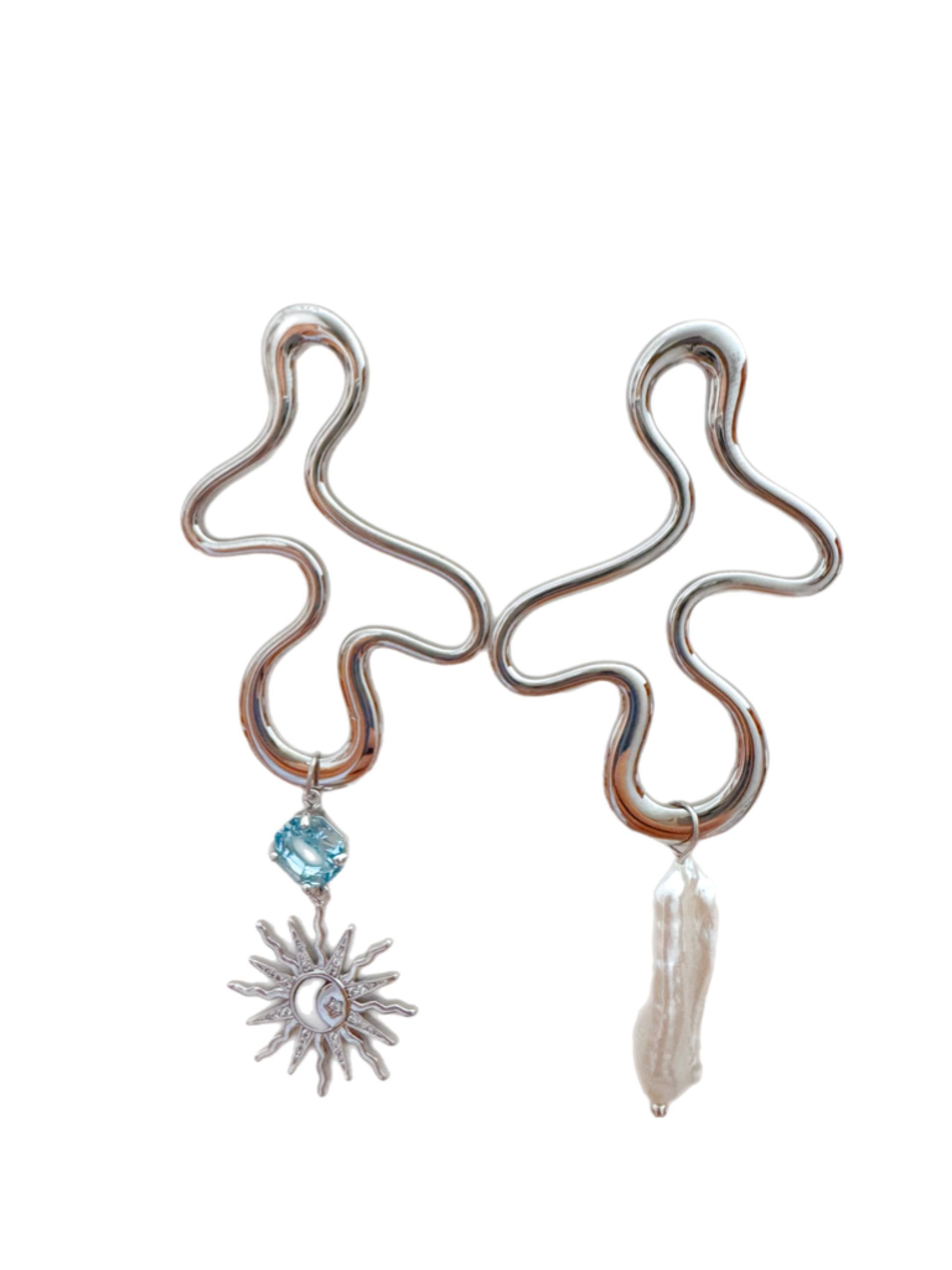 Aurora Asimétrica. El amanecer en forma de joya. Aurora Asimétrica. The dawn captured in a jewel.